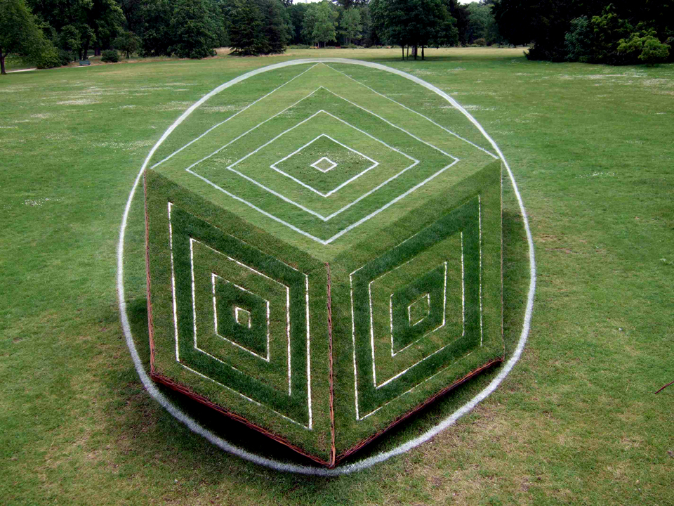 3d cube in anamorphosis into Bagatelle garden. Anamorphose vegetale